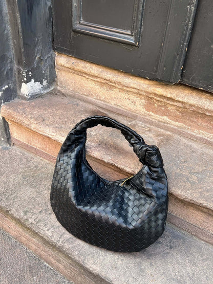 Sac bandoulière tressé – Élégance et intemporalité