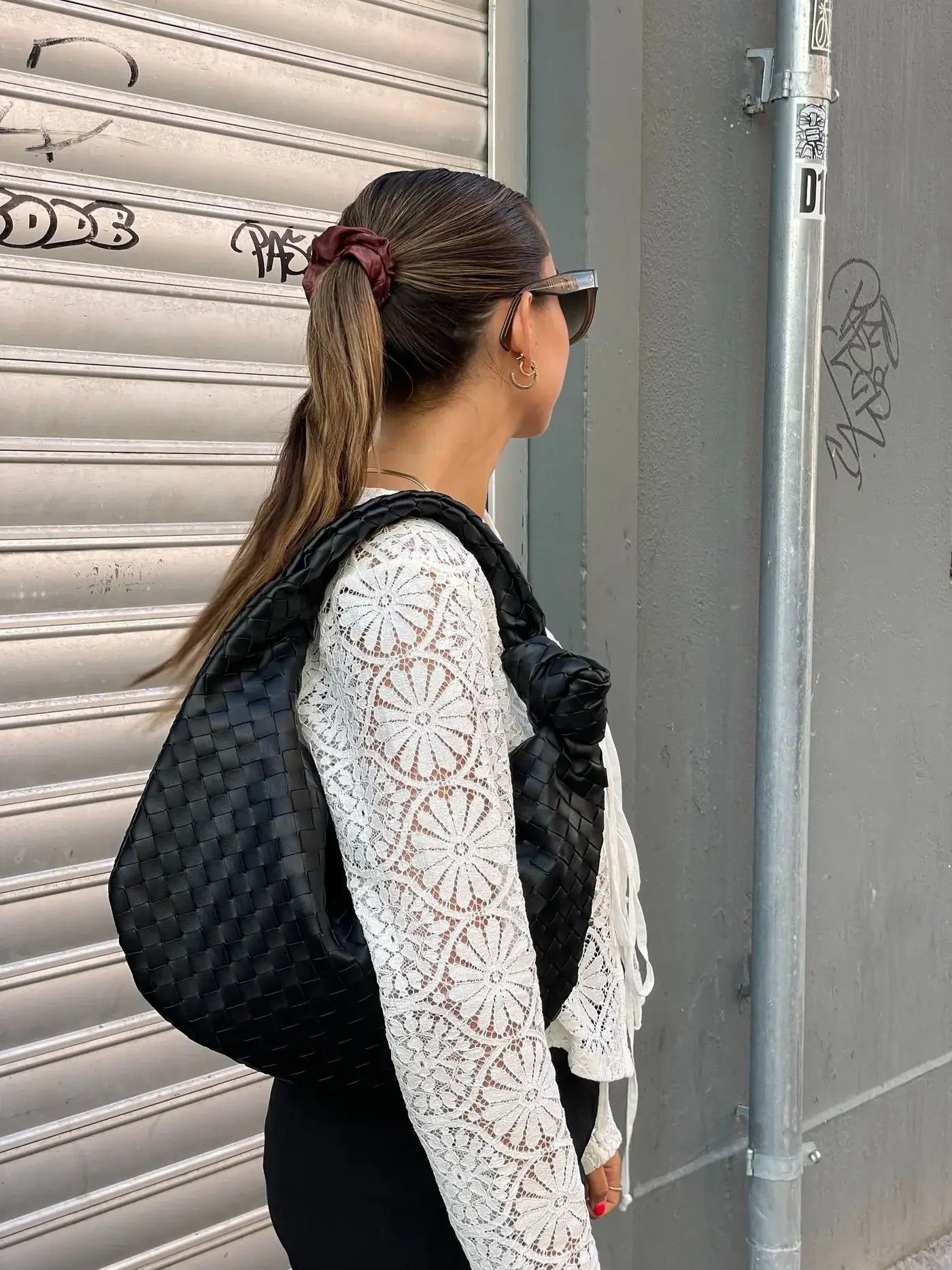 Sac bandoulière tressé – Élégance et intemporalité