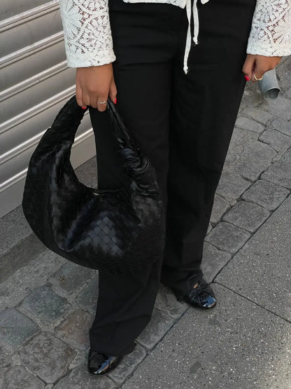Sac bandoulière tressé – Élégance et intemporalité