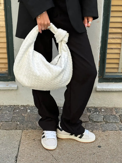 Sac bandoulière tressé – Élégance et intemporalité