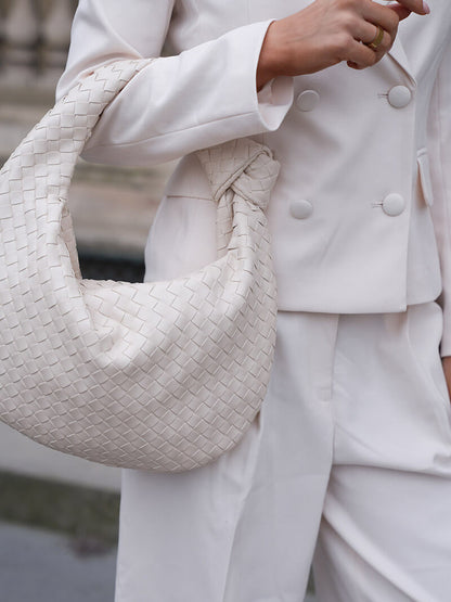 Sac bandoulière tressé – Élégance et intemporalité